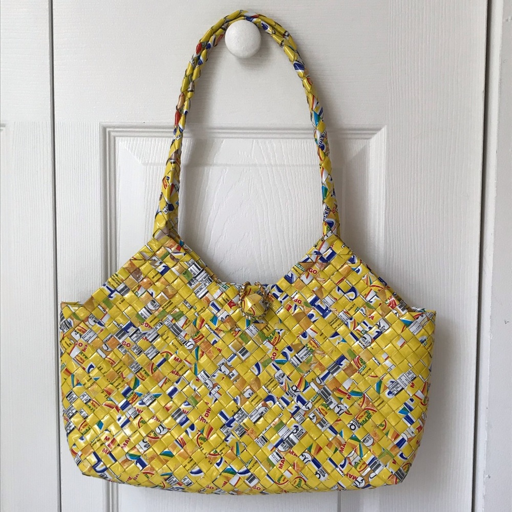 yellow woven wrapper shoulder bag